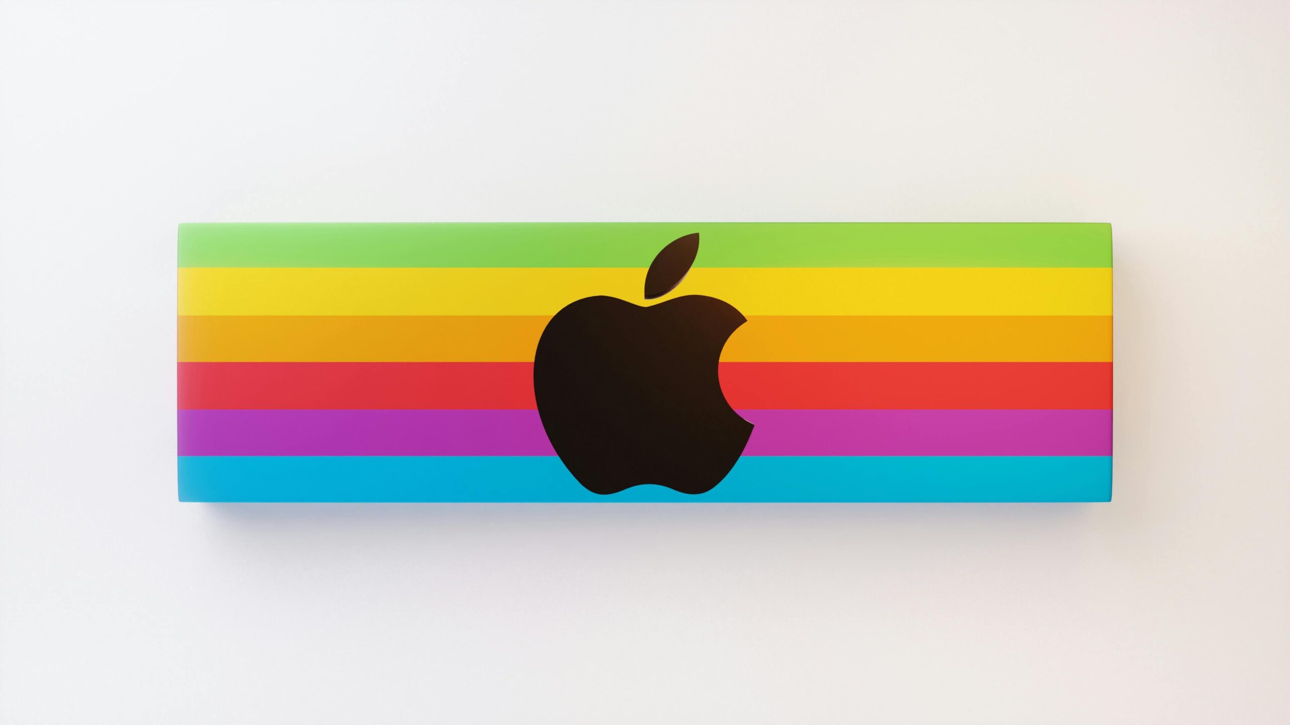 Vibrant Apple logo design featuring rainbow colors on a white background.